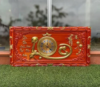 đồng hồ gỗ chữ lộc khung trạm dát vàng 41x81cm