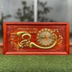 đồng hồ gỗ chữ tâm khung trơn dát vàng 41x81cm