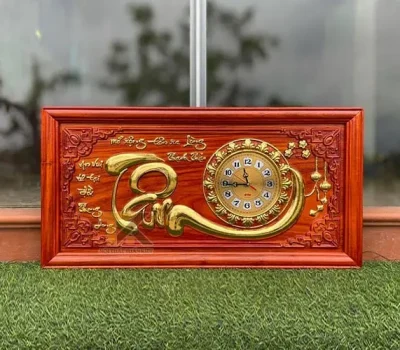 đồng hồ gỗ chữ tâm khung trơn dát vàng 41x81cm