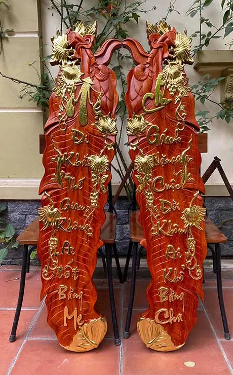 tranh câu đối lá chuối cha mẹ banner